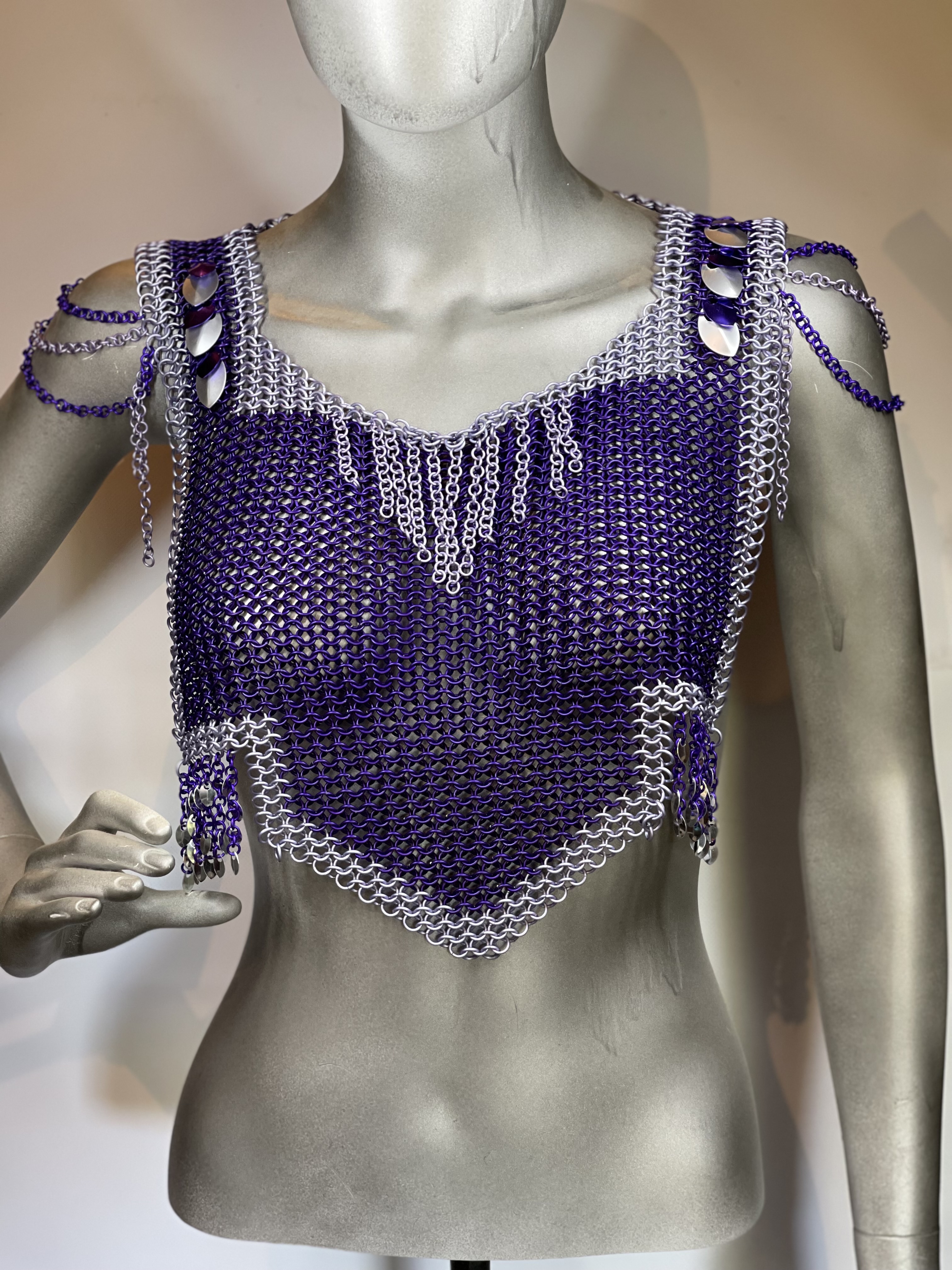 “Handcrafted European 4-in-1 chainmaille necklace in dark purple with lavender accents and silver dragon scale shoulders, named Royalborne.”
