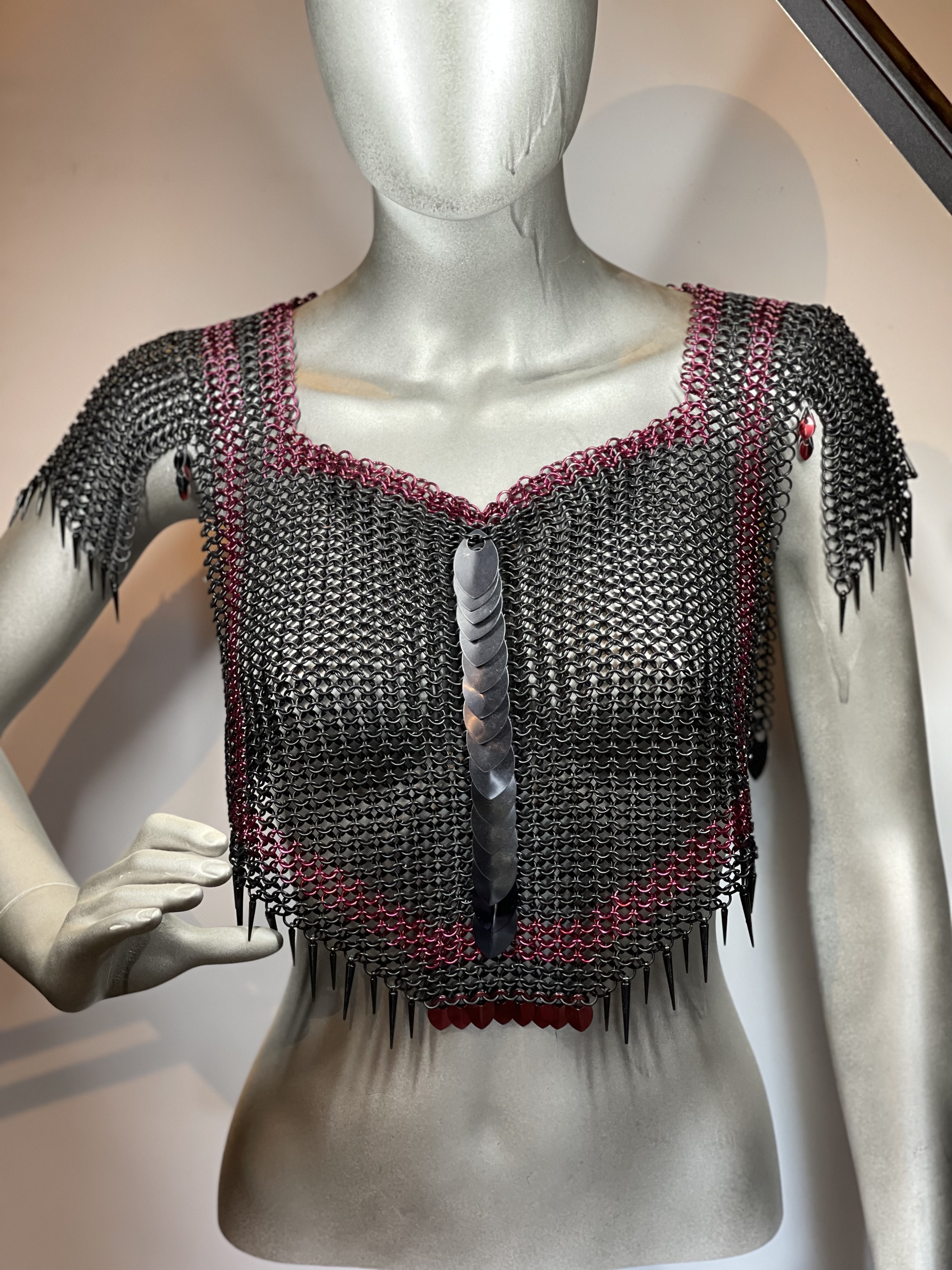 “European 4-in-1 chainmaille necklace in black with red trim and black dragon scale shoulders, named Raven—handcrafted for gothic and fantasy wear.”