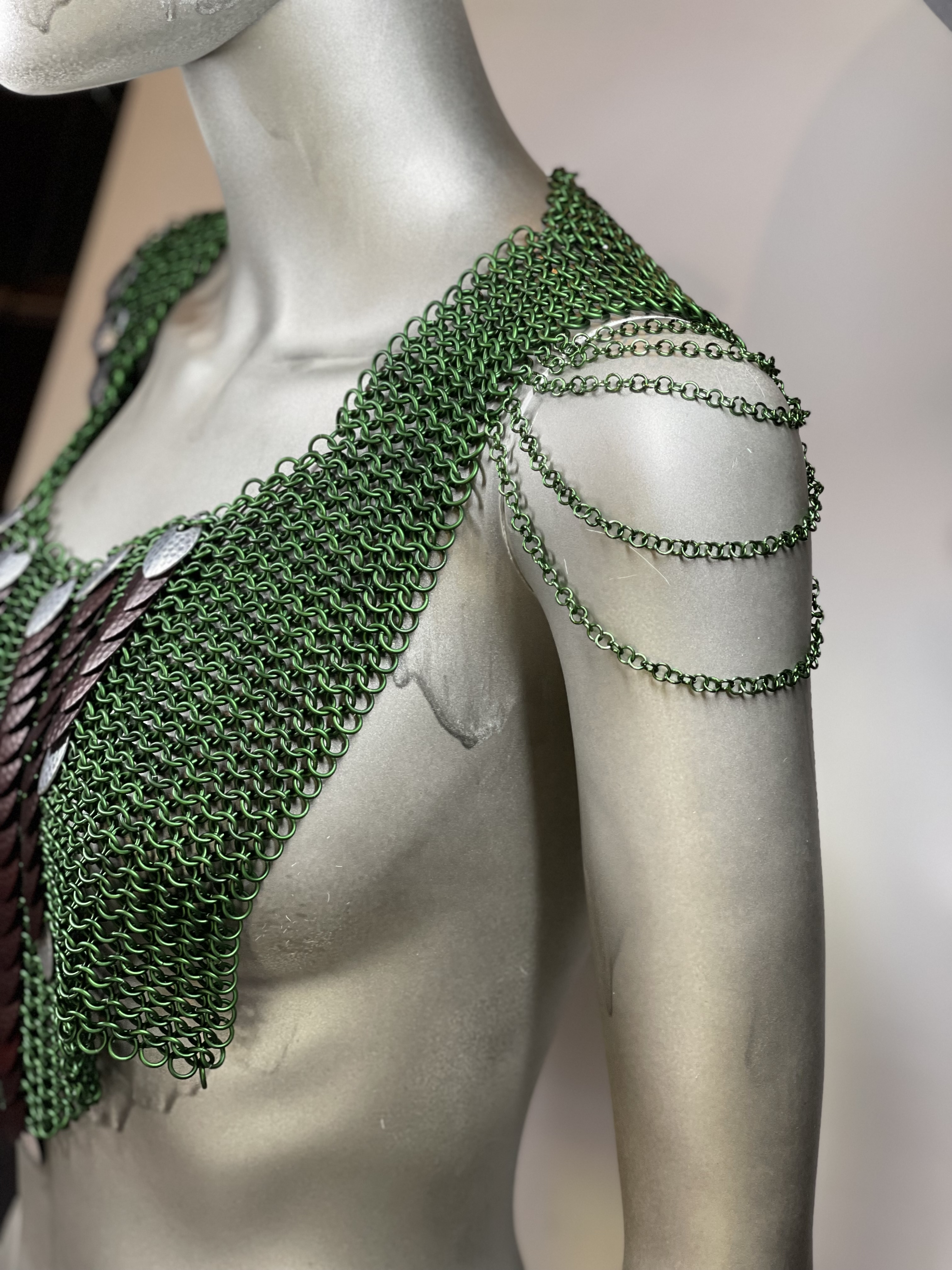 “European 4-in-1 chainmaille necklace in dark forest green with bronze and silver dragon scales on the front and shoulders, named Sherwood—handcrafted for woodland fantasy wear.”