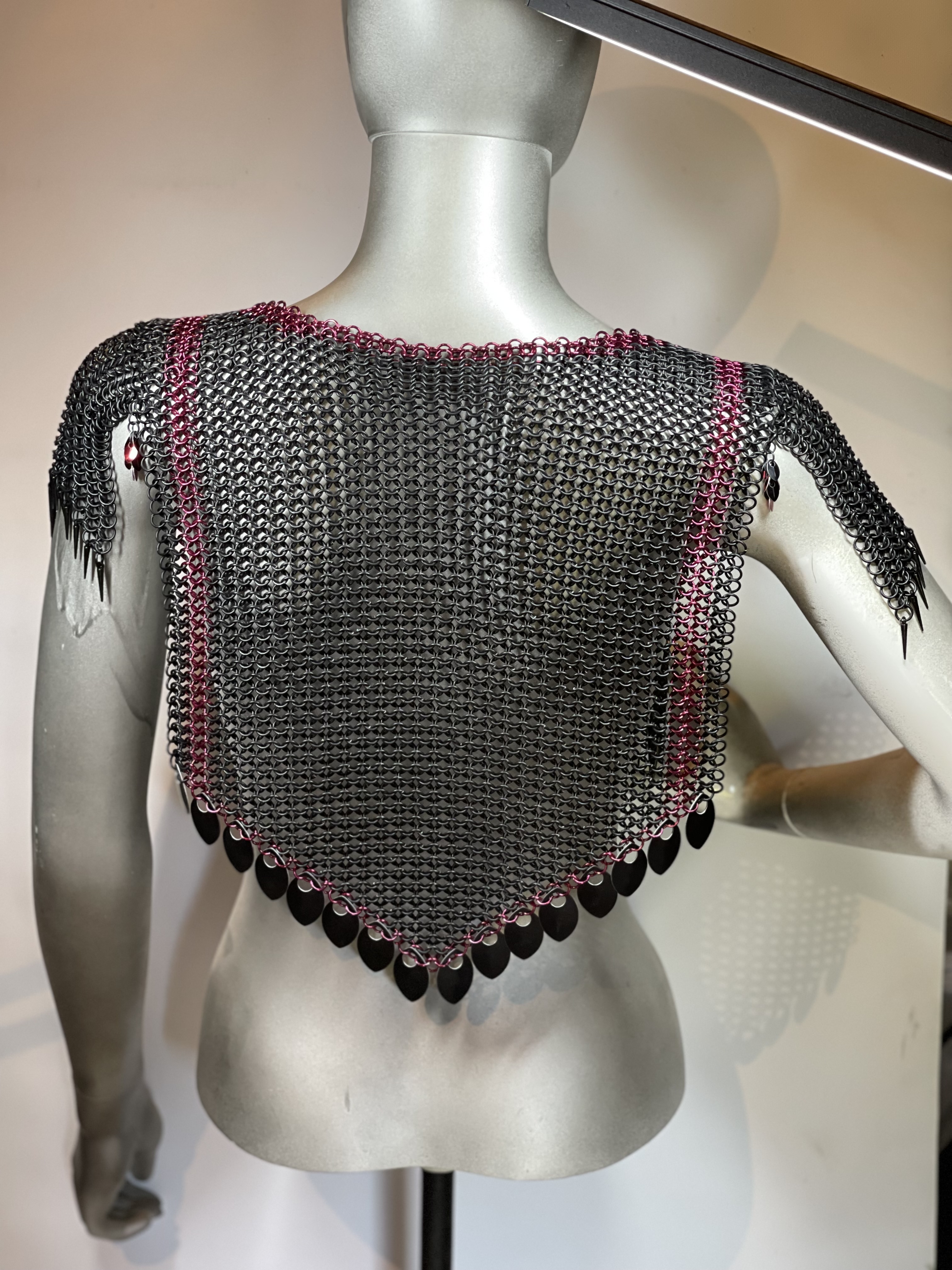 “European 4-in-1 chainmaille necklace in black with red trim and black dragon scale shoulders, named Raven—handcrafted for gothic and fantasy wear.”